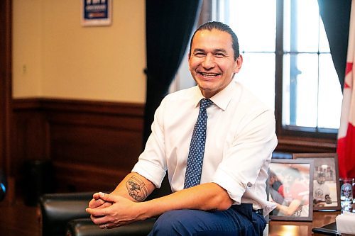 MIKAELA MACKENZIE / FREE PRESS
	
Premier Wab Kinew shows off his distinctly Manitoban new tattoo in his office on Friday, Dec. 20, 2024.

For Maggie story.
Winnipeg Free Press 2024