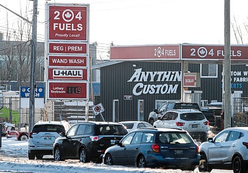 JOHN WOODS / FREE PRESS
Drivers line up for lower priced gas at a station on Waverley Street Tuesday, December 24, 2024. Provincial gas taxes will be applied again in the new year.

Reporter: ?