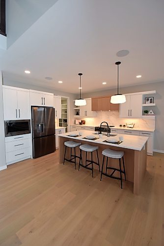 Todd Lewys / Free Press
Modern yet warm, the island kitchen is a chef’s dream with its wonderful balance of utility and fetching finishes.