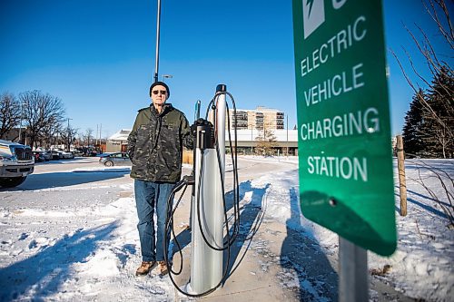 MIKAELA MACKENZIE / FREE PRESS
	

Jeff Mansfield, who has stopped using the Bill &amp; Helen Norrie Library EV charging station since the app he uses to connect started charging him for the service, at the charger on Friday, Jan. 3, 2025.

For Nicole story.
Winnipeg Free Press 2024
