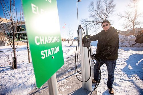 MIKAELA MACKENZIE / FREE PRESS
	

Jeff Mansfield, who has stopped using the Bill &amp; Helen Norrie Library EV charging station since the app he uses to connect started charging him for the service, at the charger on Friday, Jan. 3, 2025.

For Nicole story.
Winnipeg Free Press 2024