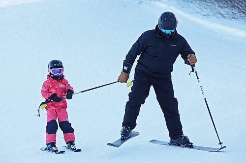 03012025
Mike Dmytriw pulls his four-year-old daughter Harper Dmytriw while they ski at Ski Valley north of Minnedosa on a cold but sunny Friday afternoon. Westman will spend the weekend in a deep freeze before temperatures improve next week. 
(Tim Smith/The Brandon Sun)
