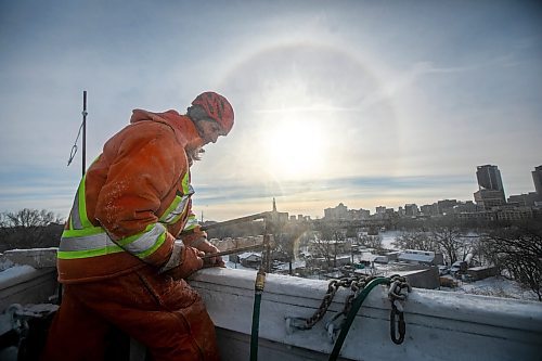MIKAELA MACKENZIE / FREE PRESS
Charles Roy adjusts the water for optimal ice creation at the St. Boniface ice climbing tower on Monday, Jan. 6, 2025. The system needs to be checked three times a day while running, and it usually takes about two weeks to create the finished tower. Temperatures need to be below -15C to build up ice, so these folks may be one of the few not looking forward to the warmer days forecasted ahead.
Standup.
Winnipeg Free Press 2025