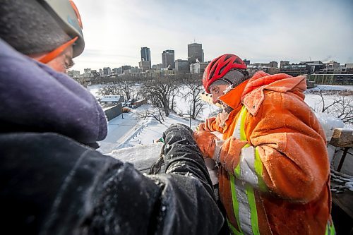 MIKAELA MACKENZIE / FREE PRESS
Rolly Magne (left) and Charles Roy adjust the water for optimal ice creation at the St. Boniface ice climbing tower on Monday, Jan. 6, 2025. The system needs to be checked three times a day while running, and it usually takes about two weeks to create the finished tower. Temperatures need to be below -15C to build up ice, so these folks may be one of the few not looking forward to the warmer days forecasted ahead.
Standup.
Winnipeg Free Press 2025