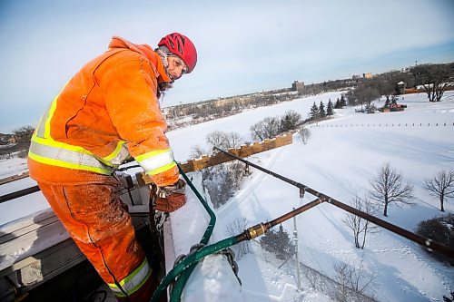 MIKAELA MACKENZIE / FREE PRESS
Charles Roy adjusts the water for optimal ice creation at the St. Boniface ice climbing tower on Monday, Jan. 6, 2025. The system needs to be checked three times a day while running, and it usually takes about two weeks to create the finished tower. Temperatures need to be below -15C to build up ice, so these folks may be one of the few not looking forward to the warmer days forecasted ahead.
Standup.
Winnipeg Free Press 2025