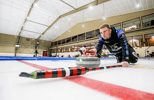 JOHN WOODS / FREE PRESS
Jordon McDonald and his team use technology to perfect their throws during a training session at the Heather Curing Club in Winnipeg Monday, January 06, 2025. 

Reporter: josh