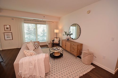Todd Lewys / Free Press
Subtly defined by a large window that lets in tons of natural light, the cosy, inviting living roomy is perfect for entertaining or watching a movie.