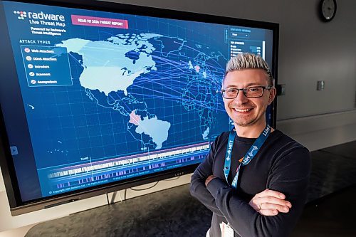 MIKE DEAL / FREE PRESS
Jared Miskimmin, MITT&#x2019;s program manager of information communication and digital technologies and skilled trades stands in front of a cyber security threat map in one of the schools computer labs. MITT is launching a cybersecurity analyst diploma program this fall, and a medical assistant and patient care diploma.
Reporter: Gabrielle Piche
250108 - Wednesday, January 08, 2025.