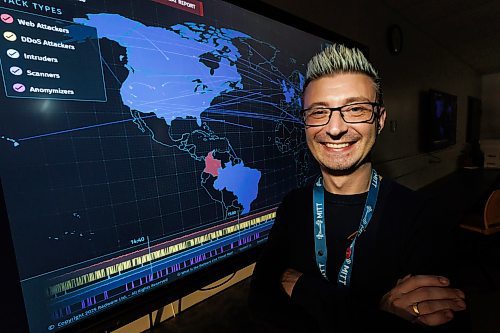 MIKE DEAL / FREE PRESS
Jared Miskimmin, MITT&#x2019;s program manager of information communication and digital technologies and skilled trades stands in front of a cyber security threat map in one of the schools computer labs. MITT is launching a cybersecurity analyst diploma program this fall, and a medical assistant and patient care diploma.
Reporter: Gabrielle Piche
250108 - Wednesday, January 08, 2025.