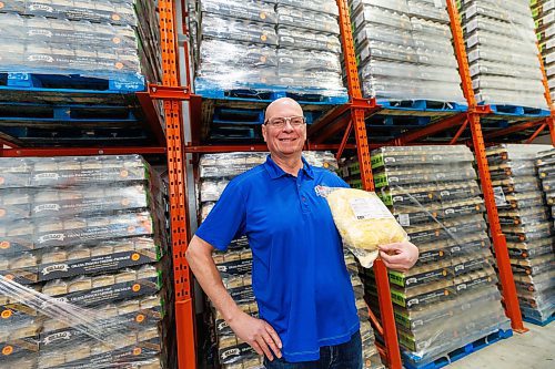 MIKE DEAL / FREE PRESS
Tom De Nardi, president of Mondo Foods, holds a bag of Mondo Special Mozzarella and White Cheddar Blend from New Zealand while in one of Mondo’s many coolers surrounded by pallets of Shredded Italian Gran Padano Cheese.
Tom De Nardi, president of Mondo Foods, which imports food for distribution throughout Canada, has faced hurdles on cheese imports due to changed government regulation. Government quota rules have led to lost business at Mondo and an unfair playing field within the cheese import industry, which leads to food inflation, Tom said.
Reporter: Gabrielle Piche
250113 - Monday, January 13, 2025.