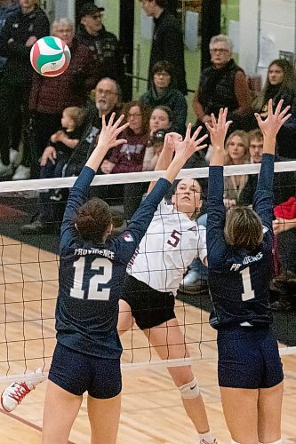 Jordyn Paddock of the Assiniboine Cougars attacks against the Providence Pilots earlier this season. (Matt Packwood/The Brandon Sun)