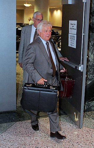 BORIS MINKEVICH / WINNIPEG FREE PRESS  060815 Jay Prober (front) walks out the the Pan Am room at the Winnipeg Convention Centre after a day of Driskell Inquiry.