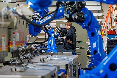 MIKE DEAL / FREE PRESS
Joel Vanderveen, Mechanical Engineering Technologist at Eascan Automation programming a robot.
Eascan Automation started in 1992, and designs, builds, commissions and services fully integrated industrial robots and custom machines.
Reporter: Aaron Epp
250115 - Wednesday, January 15, 2025.