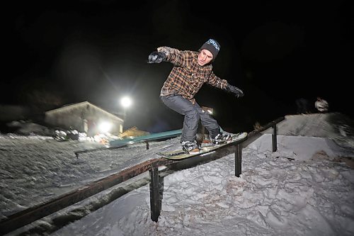 15012025
Nathan Rey grinds a rail while snowboarding in a backyard park at Chris Campbell&#x2019;s home along 17th Avenue East in Brandon on a mild Wednesday evening. 
(Tim Smith/The Brandon Sun)