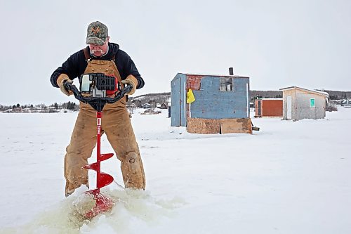 16012025
Bryan McFarlane drills a hole in the ice on Minnedosa Lake for a neighbour while ice fishing with his wife Val and friend Ray Morgan on the lake on a mild Thursday. The McFarlane’s have had an ice-fishing shack on the lake every year for the last fifteen years. They keep track of their days out and how many fish they catch. The most they’ve caught in one day this year is 12 fish, most of which they release back into the lake. (Tim Smith/The Brandon Sun)