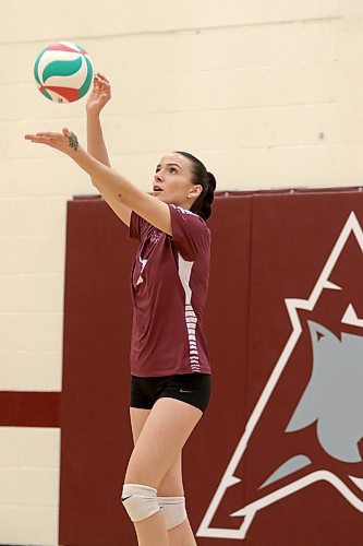Heather Brost serves for the Assiniboine College Cougars against the CMU Blazers during their MCAC women's volleyball match on Saturday. (Thomas Friesen/The Brandon Sun)