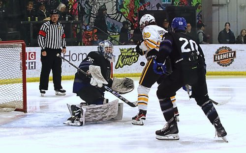 The puck drops in front of Brandon Wheat Kings forward Cole Lobreau (20) after a save by Interlake Lightning goaltender Dylan McFadyen (35) during their Manitoba U18 AAA Hockey League game at J&amp;G Homes Arena on Saturday evening as Interlake defenceman Ben Chapman (20) watches. Lobreau was able to send the rebound past McFadyen to open the scoring 91 seconds into the second period. (Perry Bergson/The Brandon Sun)
Jan. 18, 2025