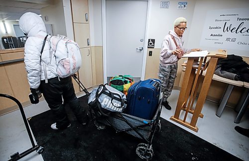 JOHN WOODS / FREE PRESS
Honesty gets checked in by Fatima Sheriff, shelter host at Oak Table/Just A Warm Sleep (JAWS) overnight shelter in Osbourne Village Tuesday, January 14, 2025. Just A Warm Sleep, an overnight shelter in Osborne Village that recently made renovations to provide a safe, dignified place to stay for homeless people. Accessible showers, individual washrooms, lockers, phone chargers and a community kitchen and dining room are some amenities at the shelter and breaks the mould of what traditional overnight shelters in Winnipeg can look like.
Reporter: nicole