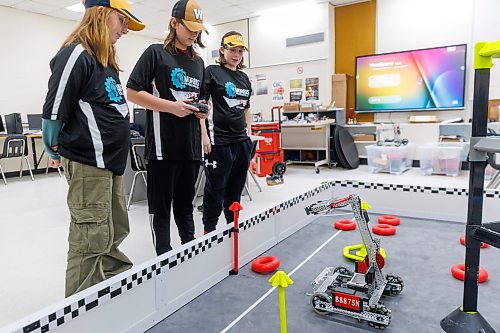 MIKE DEAL / FREE PRESS
(From left) Gold Team members, Hannah Klassen, Zajac St. Godard, and Tennyson Janke, test out their robot in the ring.
Unlike other provinces, Manitoba doesn't have a robotics curriculum nor credit. Tech teacher at Morris School, JP Jamieson, is working to change that. Jamieson has started a robotics team and they've had a busy year, including robotics tournaments in Minnesota and North Dakota. There are no tournaments in Manitoba, so that's why they have to travel. Two teams and two robots are headed to another tournament in Minnesota on Jan. 24.
Reporter: Ben Waldman
250121 - Tuesday, January 21, 2025.