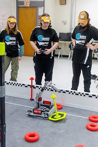 MIKE DEAL / FREE PRESS
(From left) Gold Team members, Hannah Klassen, Tennyson Janke, and Zajac St. Godard, test out their robot in the ring.
Unlike other provinces, Manitoba doesn't have a robotics curriculum nor credit. Tech teacher at Morris School, JP Jamieson, is working to change that. Jamieson has started a robotics team and they've had a busy year, including robotics tournaments in Minnesota and North Dakota. There are no tournaments in Manitoba, so that's why they have to travel. Two teams and two robots are headed to another tournament in Minnesota on Jan. 24.
Reporter: Ben Waldman
250121 - Tuesday, January 21, 2025.