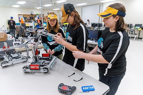 MIKE DEAL / FREE PRESS
(From left) Gold Team members, Hannah Klassen, Zajac St. Godard, and Tennyson Janke, make some adjustments to their robot after testing it out in the ring.
Unlike other provinces, Manitoba doesn't have a robotics curriculum nor credit. Tech teacher at Morris School, JP Jamieson, is working to change that. Jamieson has started a robotics team and they've had a busy year, including robotics tournaments in Minnesota and North Dakota. There are no tournaments in Manitoba, so that's why they have to travel. Two teams and two robots are headed to another tournament in Minnesota on Jan. 24.
Reporter: Ben Waldman
250121 - Tuesday, January 21, 2025.