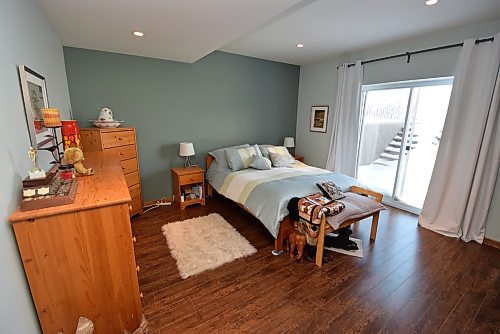 Todd Lewys / Free Press
One of the lower-level bedrooms has a sliding patio door that lets in tons of natural light &#x2014; and leads out to the backyard patio.