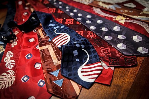 JOHN WOODS / FREE PRESS
Paul Rempel, who collects ties from the 1940s, shows some of his jacquard fabric collection at his home Tuesday, January 28, 2025. In jacquard fabric, the pattern and colours are incorporated into the weave instead of being printed or dyed onto the surface.