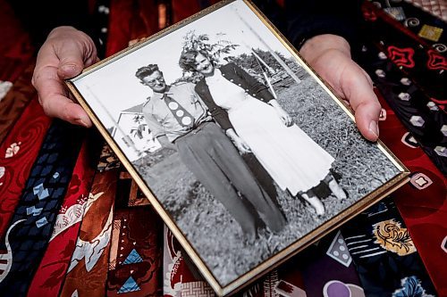 JOHN WOODS / FREE PRESS
Paul Rempel, who collects ties from the 1940s, shows some of his collection with a photo of his parents David and Kathryn at his home Tuesday, January 28, 2025.
Reporter: dave