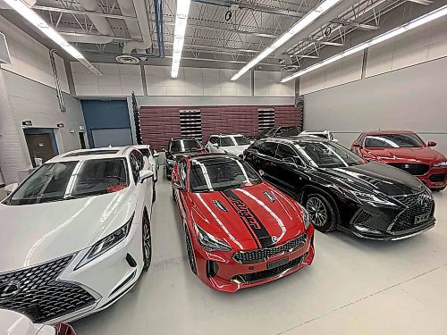 MIKE DEAL / FREE PRESS
The stolen vehicles were meant to appear as though they were properly owned by and then sold by one person to dealerships, through online platforms and out of a business.