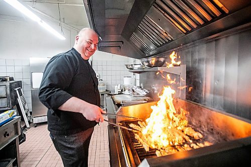 MIKAELA MACKENZIE / FREE PRESS
Nick Douklias at Helios Restaurant, which is celebrating its 10th anniversary this year, grills up chicken souvlaki in the kitchen on Wednesday, Jan. 29, 2025. Since 2021, when they ceased accepting take-out orders, they've been catering only.
For intersection story.
Winnipeg Free Press 2025
