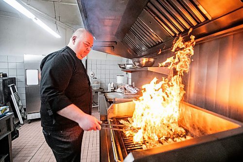 MIKAELA MACKENZIE / FREE PRESS
Nick Douklias at Helios Restaurant, which is celebrating its 10th anniversary this year, grills up chicken souvlaki in the kitchen on Wednesday, Jan. 29, 2025. Since 2021, when they ceased accepting take-out orders, they've been catering only.
For intersection story.
Winnipeg Free Press 2025
