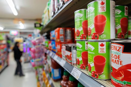 MIKE DEAL / FREE PRESS
Many producers already label their products with Made in Canada labels.
Tarik Zeid, manager at Food Fare Silver Heights (2285 Portage Ave), puts up Made in Canada signage to help consumers determine what is Canadian and what is American.
Reporter: Scott Billeck
250203 - Monday, February 03, 2025.