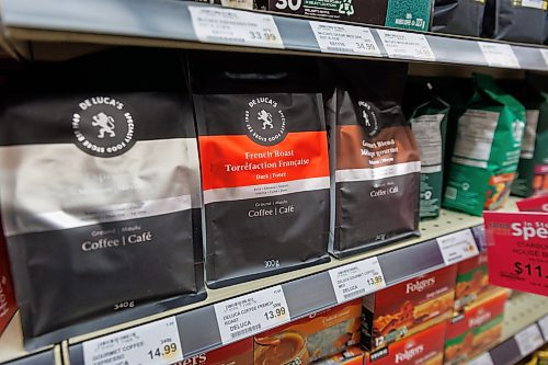 MIKE DEAL / FREE PRESS
Winnipeg&#x2019;s De Luca&#x2019;s coffee roasters have been around for many years.
Tarik Zeid, manager at Food Fare Silver Heights (2285 Portage Ave), puts up Made in Canada signage to help consumers determine what is Canadian and what is American.
Reporter: Scott Billeck
250203 - Monday, February 03, 2025.