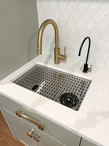 Marc LaBossiere / Free Press
The main faucet at the coffee bar is fed via the main hot and cold water feeds in the house, whereas the smaller faucet provides cold reverse-osmosis water only.