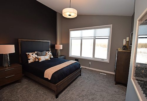 Todd Lewys / Free Press
Situated beneath a gorgeous vaulted ceiling, the owner’s suite is a warm, naturally bright space that draws you in with a synergy of warmth, space and functionality.