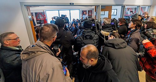MIKE DEAL / FREE PRESS
The media crowd around the doorway to the room where Federal Public Safety Minister David McGuinty, Premier Wab Kinew, Sport Minister Terry Duguid, minister responsible for Prairies Economic Development Canada, and MP Ben Carr (Winnipeg South Centre) met with law enforcement officers from many branches Tuesday to talk about border security and get a demonstration on how the agents at the border search for fentanyl.
Reporter: Scott Billeck
250204 - Tuesday, February 04, 2025.