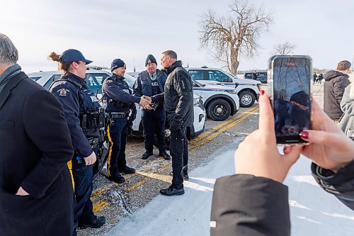 MIKE DEAL / FREE PRESS
Federal Public Safety Minister David McGuinty chats with some RCMP officers at the border Tuesday afternoon.
Federal Public Safety Minister David McGuinty, Premier Wab Kinew, Sport Minister Terry Duguid, minister responsible for Prairies Economic Development Canada, and MP Ben Carr (Winnipeg South Centre) met with law enforcement officers from many branches Tuesday to talk about border security and get a demonstration on how the agents at the border search for fentanyl.
Reporter: Scott Billeck
250204 - Tuesday, February 04, 2025.