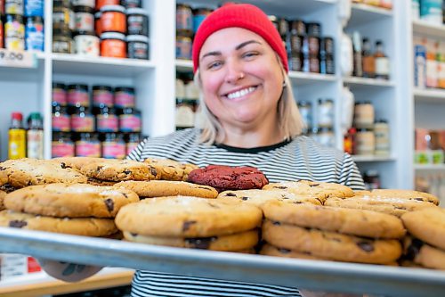BROOK JONES/FREE PRESS
Black Market Provisions at 550 Osborne St. in Winnipeg, Man., source goods locally and within Canada as a way of encourging customers to shop local. Black Market Provisions co-owner Angela Farkas, 42, tray of fresh baking that include dark chocolate sea salt cookies and the feature of the month, red velvet Oreo cookies as she is pictured Wednesday, Feb.. 5, 2025.