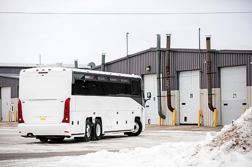 MIKAELA MACKENZIE / FREE PRESS
	

A bus pulls in behind the Motor Coach Industries building in Pembina, North Dakota on Wednesday, Feb. 5, 2025.

For Conrad story.
Winnipeg Free Press 2025