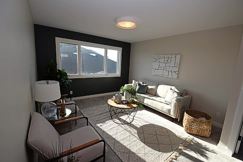 Todd Lewys / Free Press
The second floor starts off with a delightful, sun-filled loft.