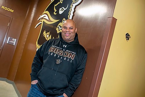 BROOK JONES/FREE PRESS
The University of Manitoba Bisons football team's newly minted head coach Stan Pierre, 53, is pictured in front of a Bison logo next to the Pat Gill Equipment Room at Princess Auto Stadium in Winnipeg, Man., Monday, Feb. 10, 2025.