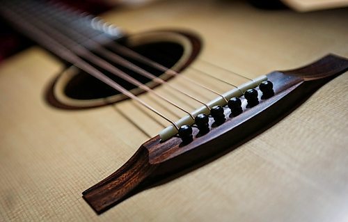 JOHN WOODS / FREE PRESS
One of Phil Campbell-Enns’ guitars is photographed in his basement workshop Tuesday, February 11, 2025. Campbell-Enns, a pastor at Home Street Mennonite Church, side hustle is building acoustic guitars in his basement workshop.

Reporter: dave