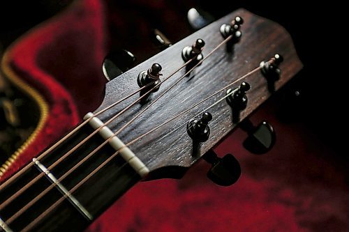 JOHN WOODS / FREE PRESS
One of Phil Campbell-Enns’ guitars is photographed in his basement workshop Tuesday, February 11, 2025. Campbell-Enns, a pastor at Home Street Mennonite Church, side hustle is building acoustic guitars in his basement workshop.
Reporter: dave