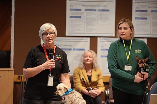 PAT Dogs coordinator Ngaire Abernethy (left) and handler Emmy Elliott present the dog therapy proposal to the Brandon school board during the general meeting Monday evening. (Abiola Odutola/The Brandon Sun)
