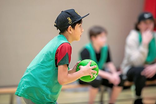 BROOK JONES/FREE PRESS
Minor dodgeball player Ben Gair is in a defensive stance during a scrimmage game at Laverendrye School in Winnipeg, Man., Wednesday, Feb. 12, 2024. The 11-year-old will be competing at the 2025 World Dodgeball Federation Youth Open in Calgary, Alta., from Feb. 18 to 22.