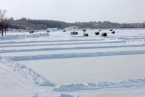 13022025
Ice sheets for skating are cleared on Minnedosa Lake n ear ice fishing shacks in advance of this weekend&#x2019;s 2025 Skate the Lake and Rock the Lake pond hockey and curling tournaments. The event runs Saturday and Sunday. 
(Tim Smith/The Brandon Sun)