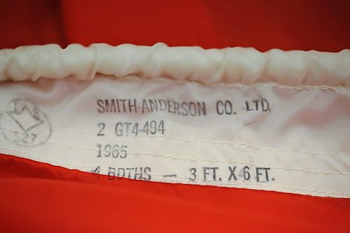 The stamp of the manufacturing company is still legible on a Canadian Maple Leaf flag found in the archives of the Royal Canadian Artillery Museum at CFB Shilo. This particular flag was one of the first 12,000 printed in Canada in 1965, and is among only a few known to still exist. (Matt Goerzen/The Brandon Sun)
