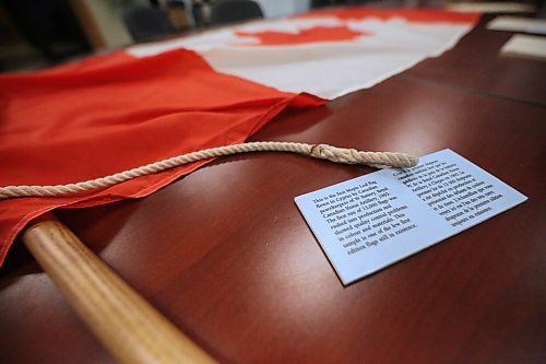 One of the first 12,000 Maple Leaf flags ever printed in Canada lies on a table at the Royal Canadian Artillery Museum at CFB Shilo before being put on display in the museum foyer on Friday morning. (Matt Goerzen/The Brandon Sun)