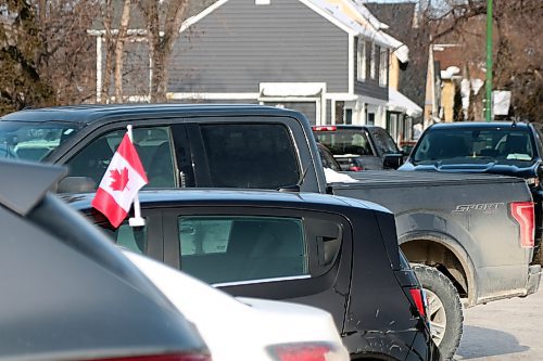 NICOLE BUFFIE / FREE PRESS Residents across Winnipeg put their patriotism on full display Saturday to mark Flag Day.