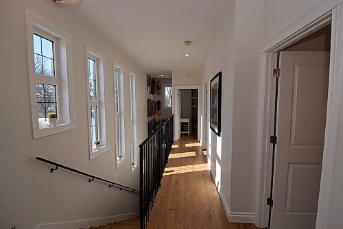 Todd Lewys / Free Press
A series of large, staggered south-facing windows allow natural light to filter into both the upper level and main floor.